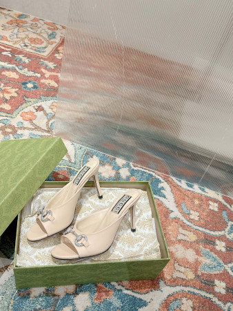 UA WOMEN'S HORSEBIT MID-HEEL SLIDE SANDAL