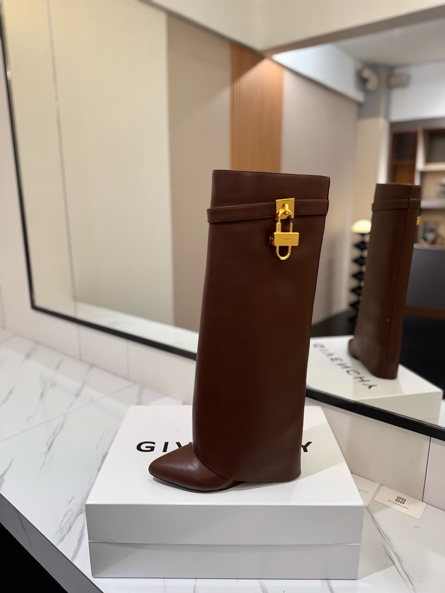 UA Givenchy Shark Lock boots in leather