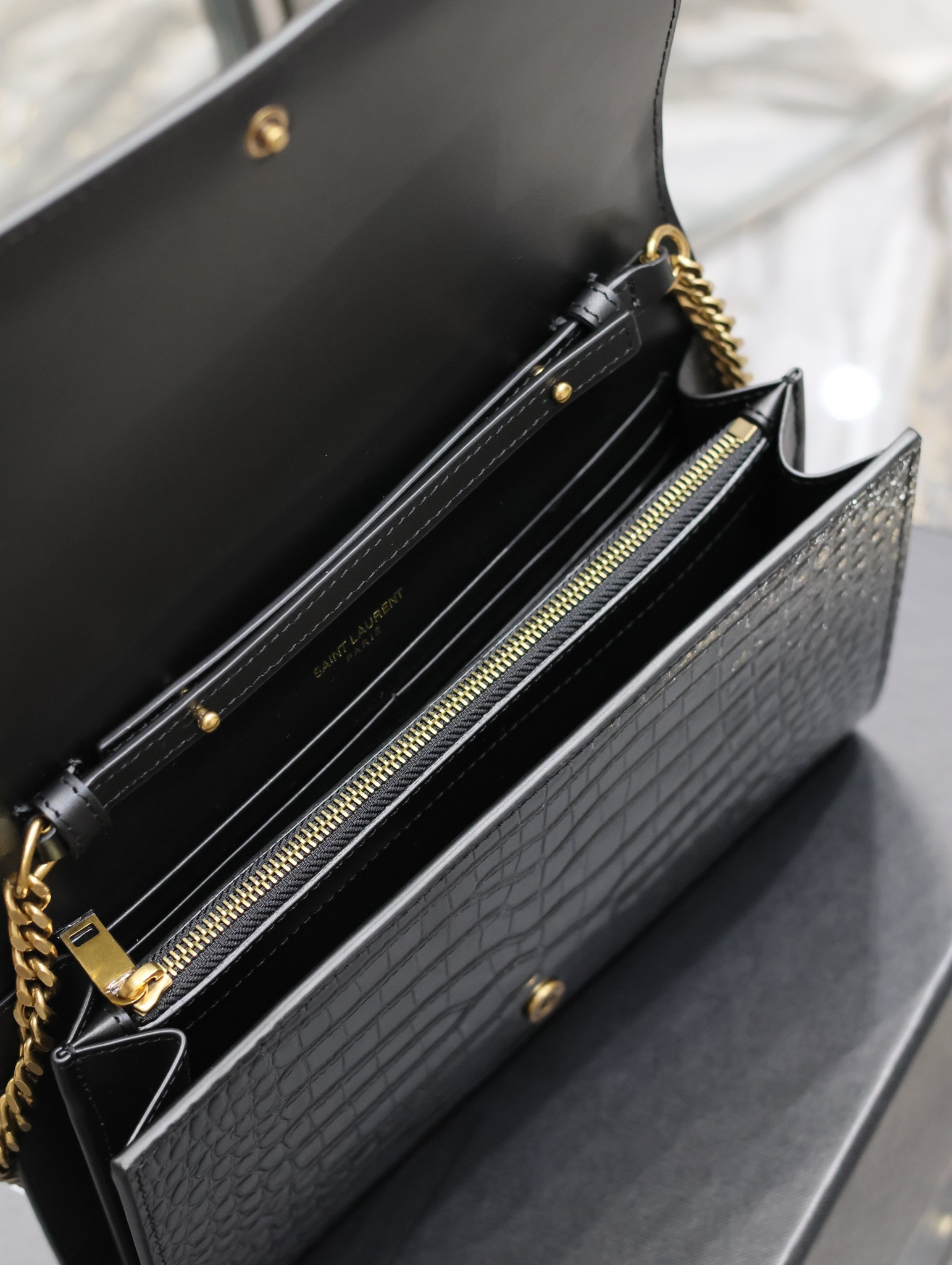 Y*L cassandre chain wallet in crocodile-embossed shiny leather