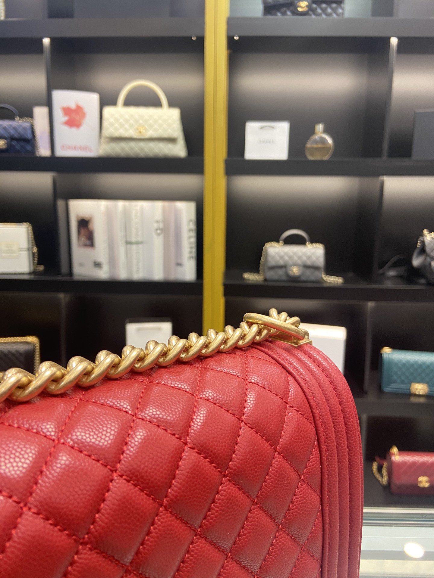 boy Ch*el handbag shiny red grained calfskin & gold-tone metal 5.9 × 9.8 × 3.5 in