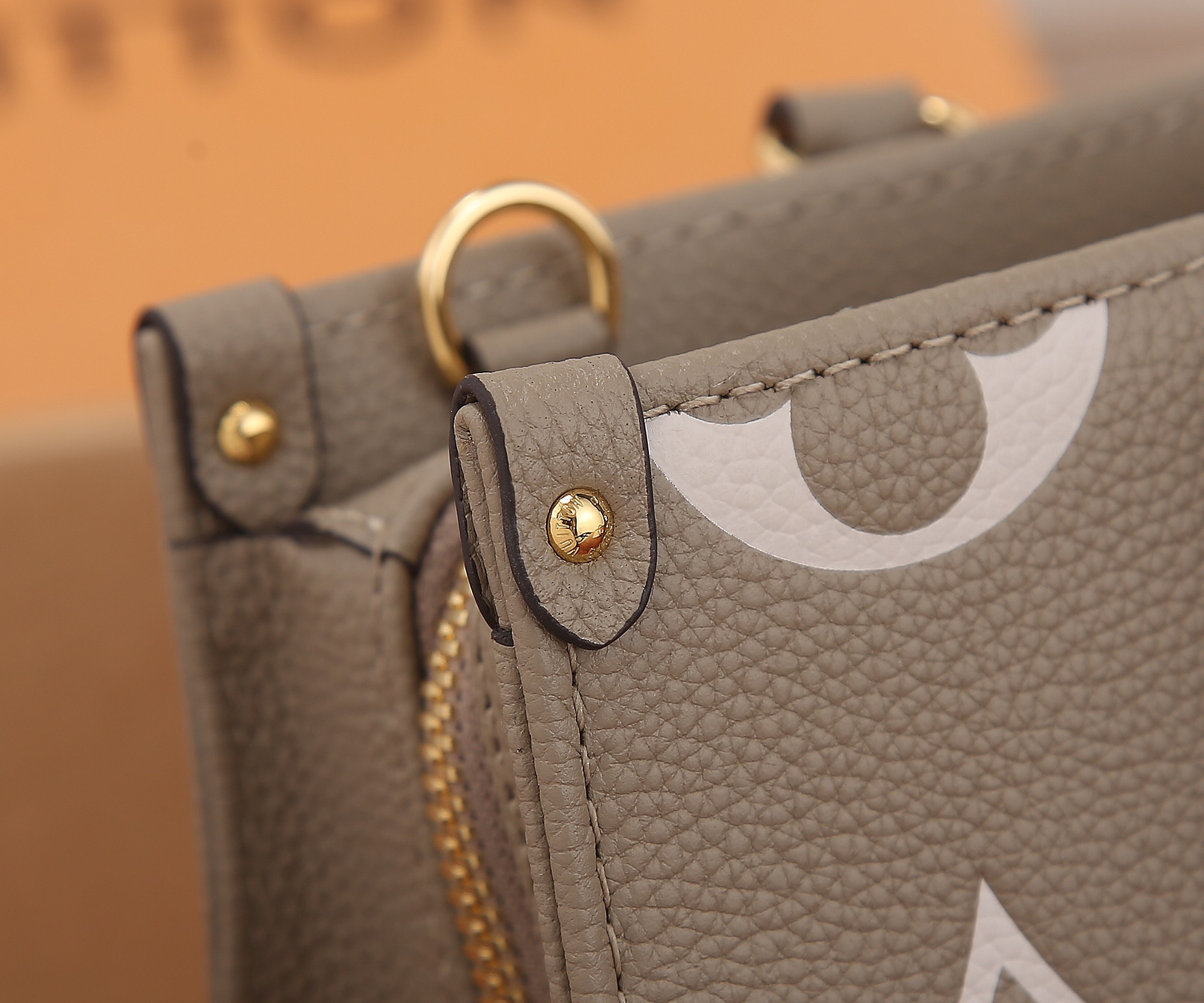 LV OnTheGo East West M23641 9.8 x 5.1 x 3.9 inches