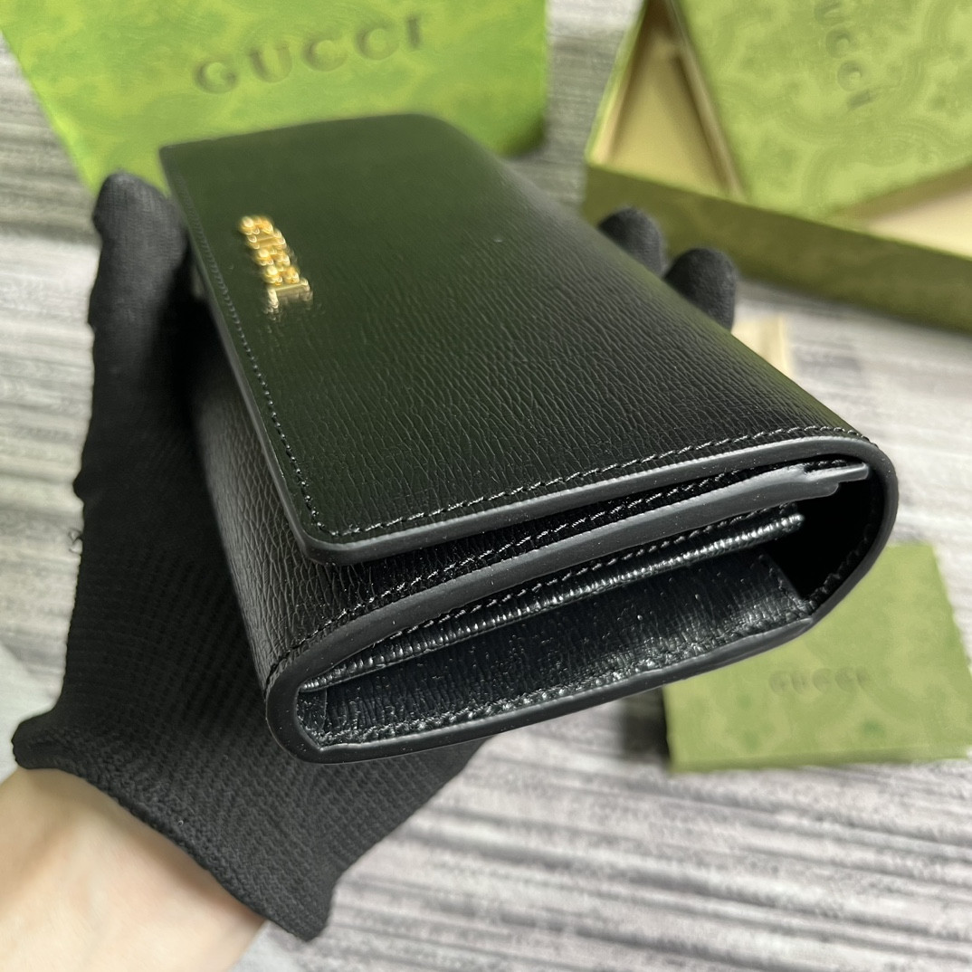continental wallet with G*u*i script  7.5"w x 4"h x 1.4"d