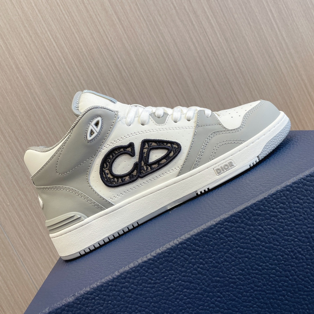 ua D*or b57 mid-top sneaker gray and white