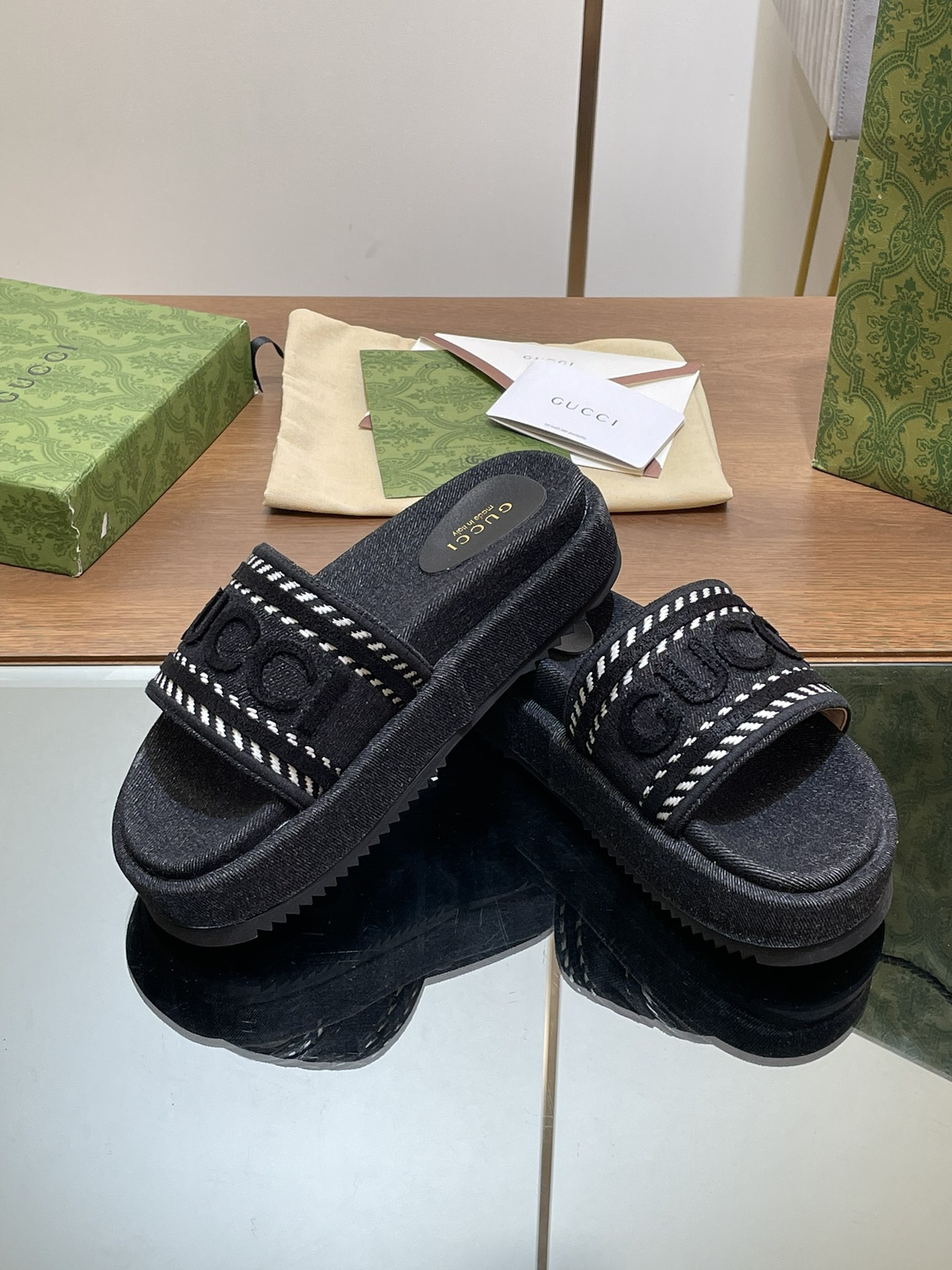 ua G*u*i slide sandal with G*u*i script