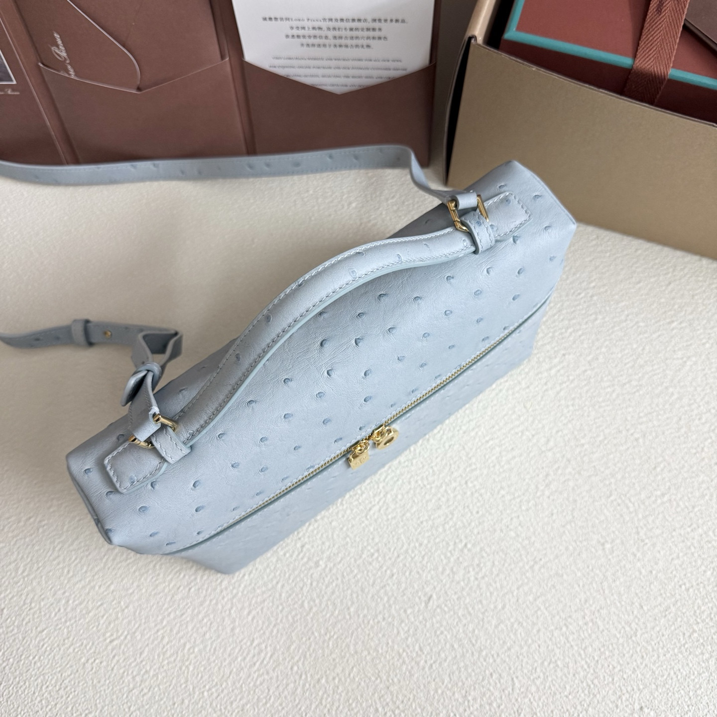 L**o p*ana extra pocket l27 ostrich-grained leather 16x27x10cm